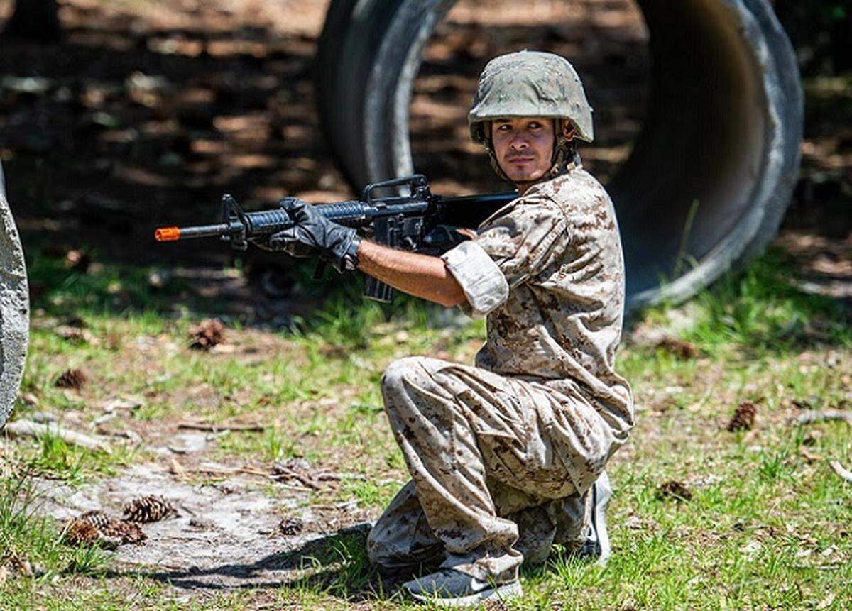 NASCAR driver Kyle Larson goes through elements of recruit training during a visit to Marine Corps Depot Parris Island on Monday.