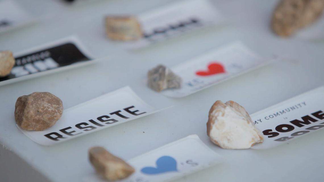 Protest stickers sit in Victor Morales' apartment in Kansas City, Mo. Perez works and studies full-time, but he also is regularly involved in activism for undocumented immigrants.