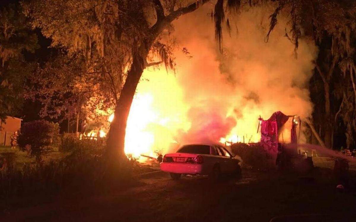 A fire ravages a mobile home in Seabrook on September 8, 2017. The fire killed three residents, including 10-year-old Ja’kyla Reid and 4-year-old Jaylyn Sanders-Nelson.