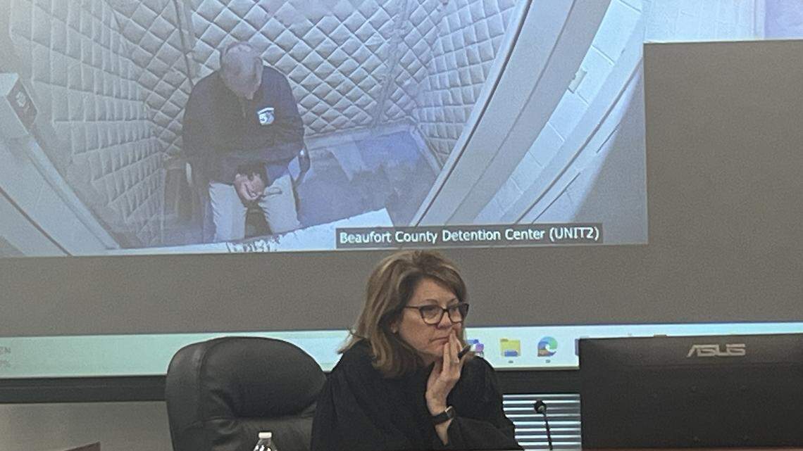Judge Meree Williamson watches a video of Magistrate Thomas Holloway when he was in custody at the Beaufort County Detention Center in October. Holloway is facing a DUI charge. Williamson is the presiding judge in the case. Motions were heard in the case Thursday in Beaufort County court.