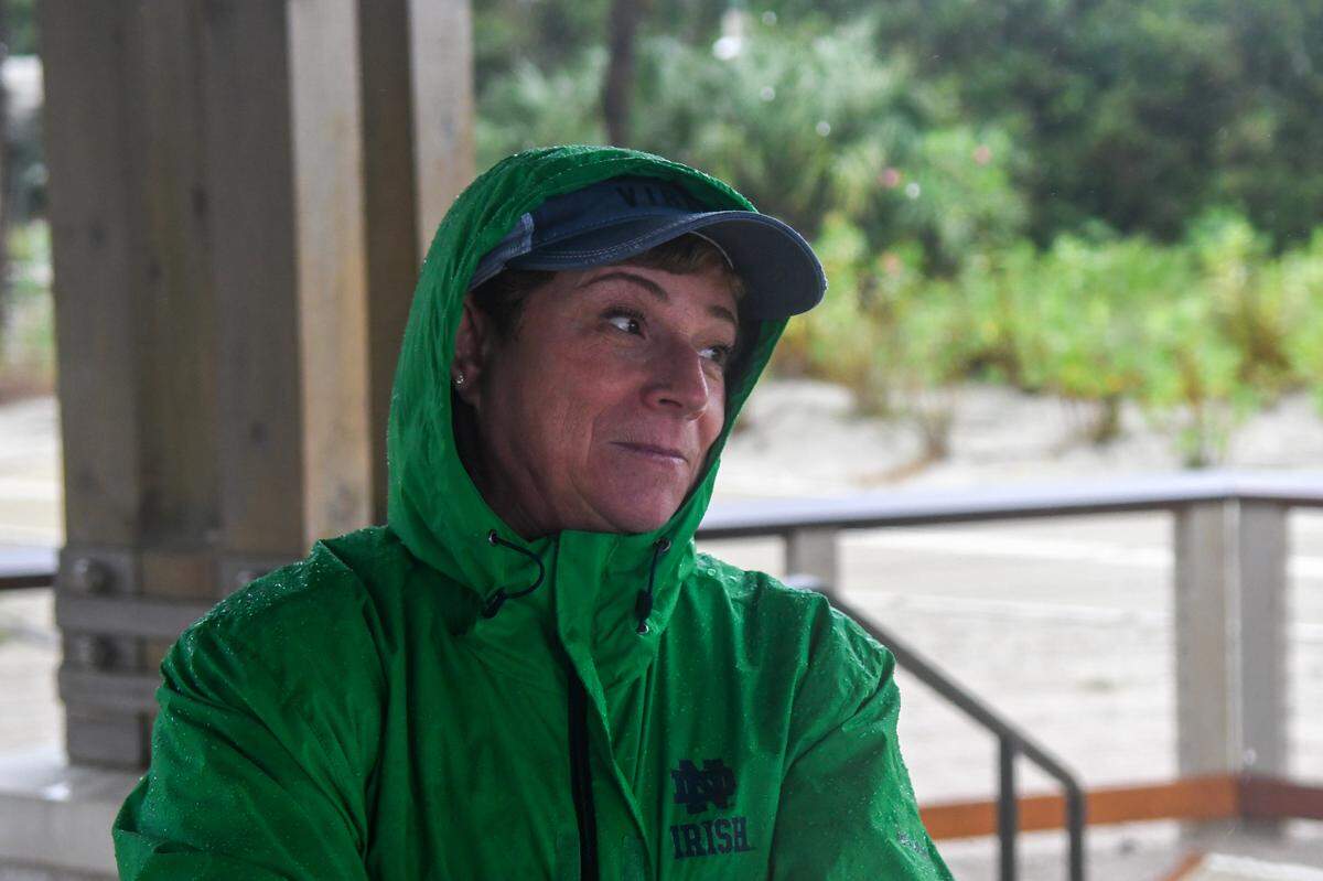 Marla Muraski was concerned about the potential for flooding from tropical Storm Debby at Coligny Beach on August. 5, 2024 on Hilton Head Island. Muraski recently moved to the Lowcountry from Boston with her family and two dogs.