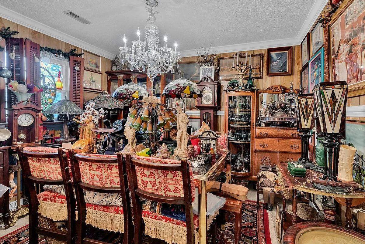 This home at 2023 Asbury Street in Georgetown sits on the banks of Winyah Bay and comes with something you don’t see every day: an extensive, eclectic collection of memorabilia that fills nearly every corner of the house.