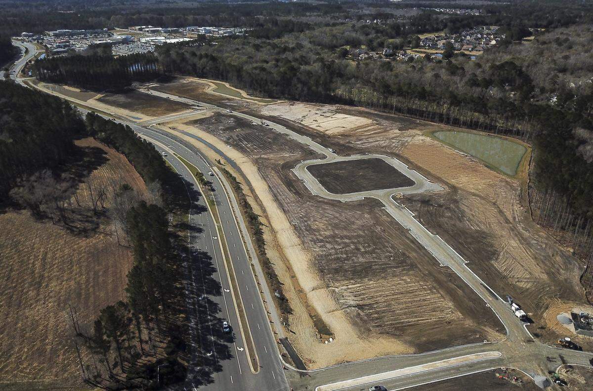 This photo taken from a drone captures the progress of Bluffton’s Washington Square. A square of green space, which the developer says is a nod to Savannah’s system of squares, is freshly cut into the 35-acre development expected to offer residential housing, retail and office space.