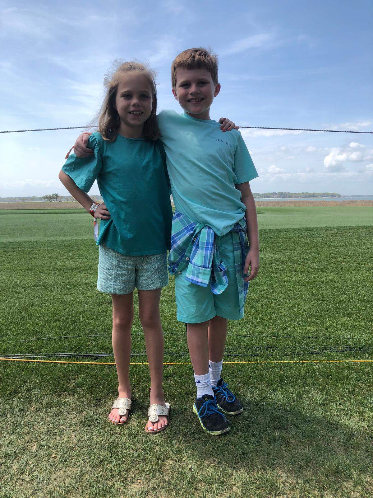 Twins Jackson and Sullivan Wright dress in their favorite color at the RBC Heritage Golf Tournament on Friday, April 13, 2018.