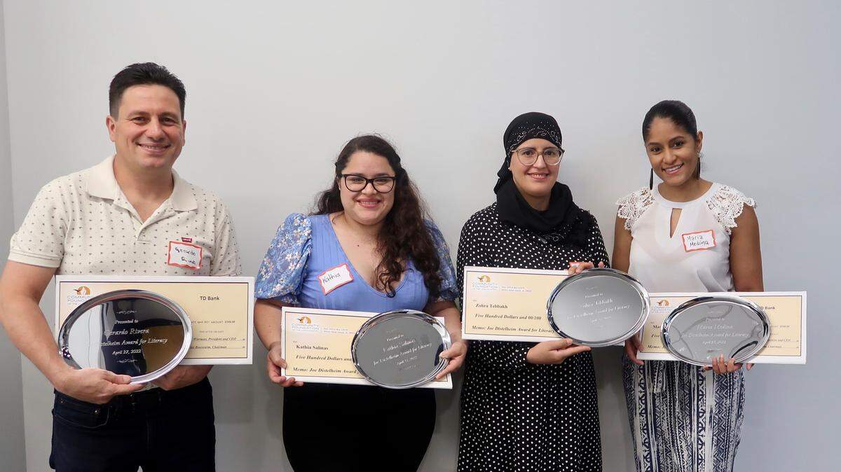 The First Joe Distelheim Awards for Literacy recipients are, from left, Gerardo Rivera, Kathia Salinas, Zohra Tebbakh and Maria Medina.