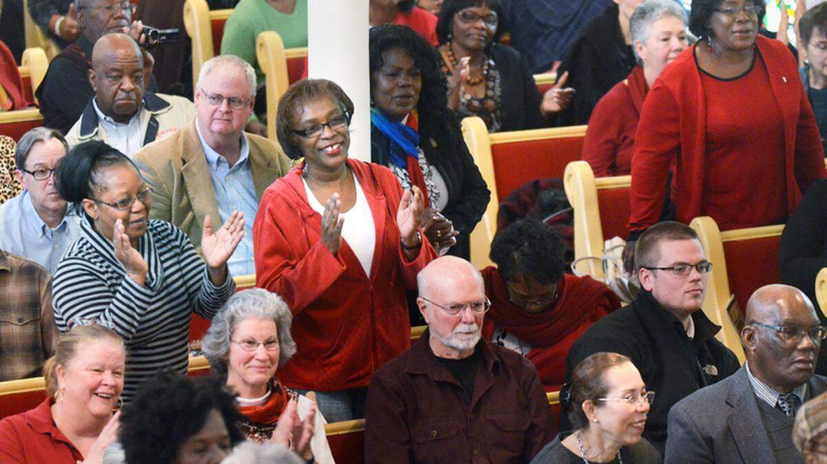 Members of the audience clap and sing during the Emancipation Day Service and Feast on Tuesday at Tabernacle Baptist Church in Beaufort. The service was held to commemorate the reading of the Emancipation Proclamation at Camp Sexton in Port Royal.