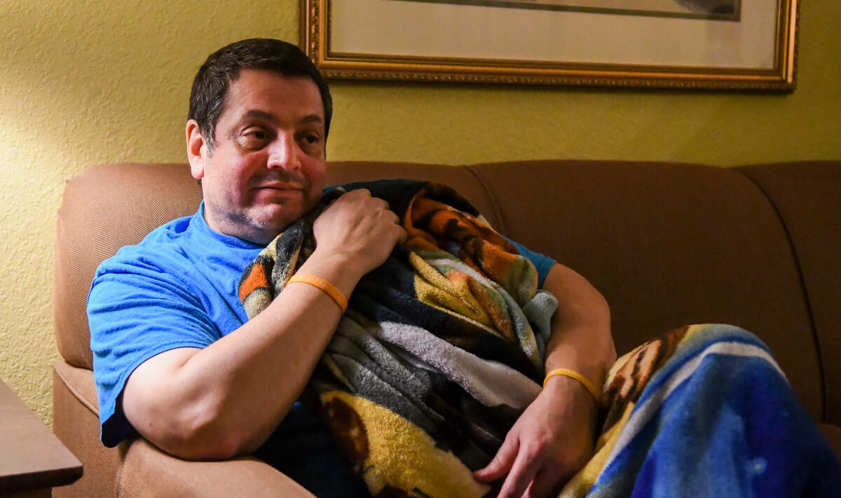 Brandon Arrieta talks about his son Cotesy while being comforted by his son’s blanket, a Star Wars themed throw on Thursday night at a condominium on Hilton Head Island. “He did not like the new Star Wars movie,” Arrieta said of his son, who took his own life Tuesday morning at the age of 16.