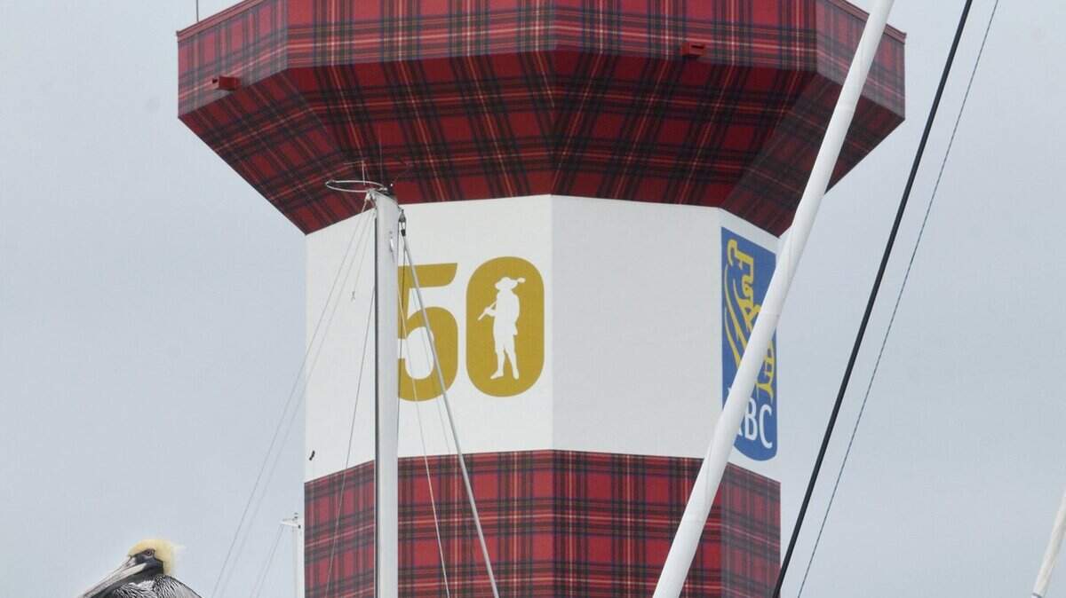 The Heritage plaid-clad Harbour Town Lighthouse looks out over the yacht basin and nearby 18th hole of Harbour Town Golf Links. The lighthouse's red stripes were converted to Heritage plaid for the RBC Heritage Presented by Boeing golf tournament's 50th anniversary.