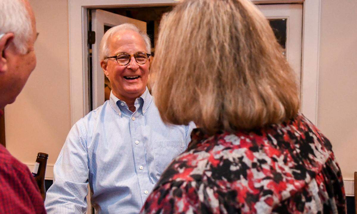 City of Beaufort Mayor Phil Cromer, center, chats with his supporters at his re-election watch party at Beaufort Yacht and Sailing Club on Tuesday, Nov. 5, 2024, on Lady’s Island in Beaufort.