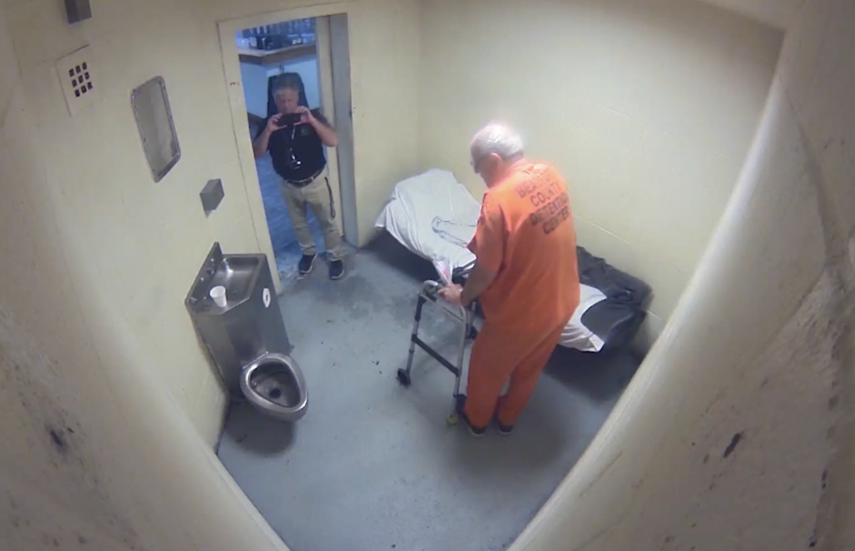 Camera footage from the Beaufort County Detention Center on Aug. 20 captures County Councilman Tom Reitz using a cell phone to take a picture inside Calvin “Skip” Hoagland’s cell.