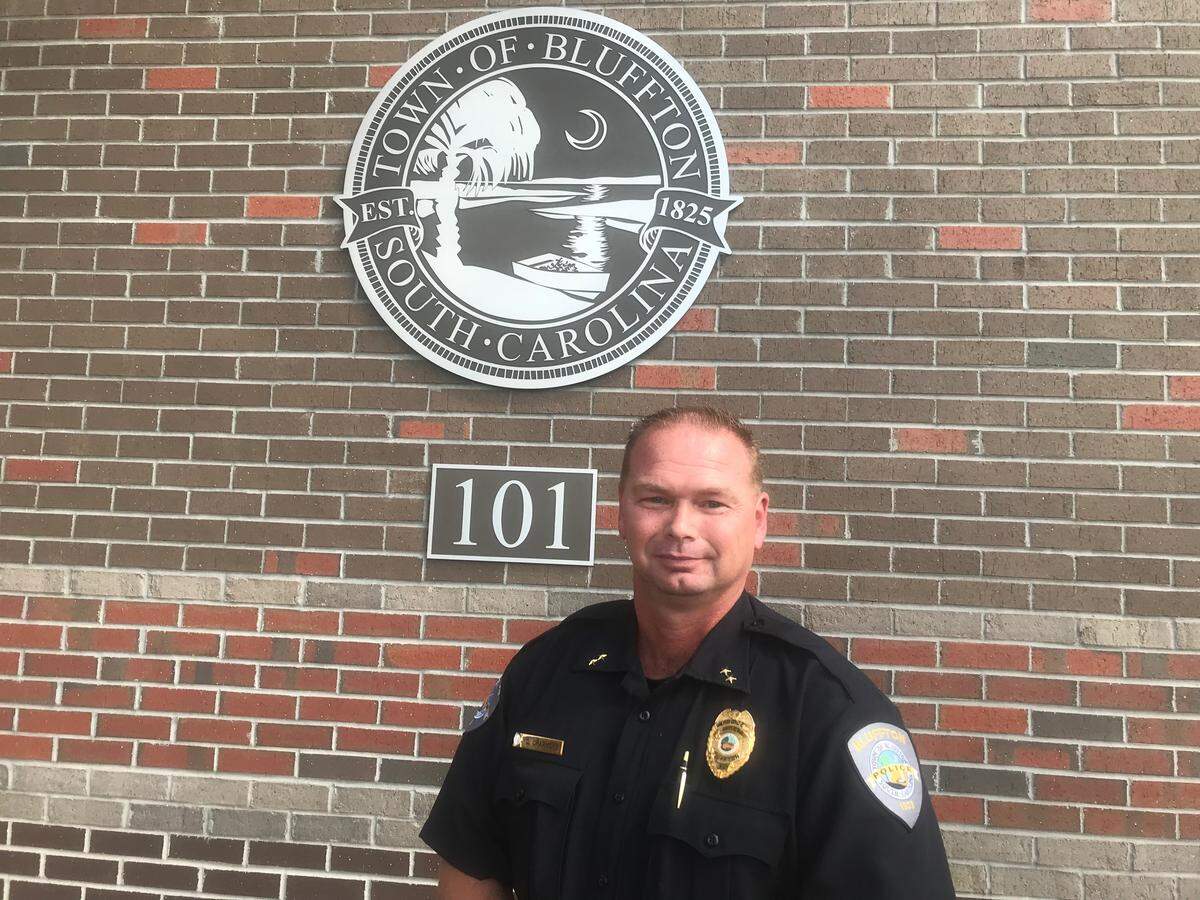 New Bluffton Police Department Chief Christopher Chapmond poses for a picture after a news conference Thursday, Sept. 6, 2018, in Bluffton, S.C.