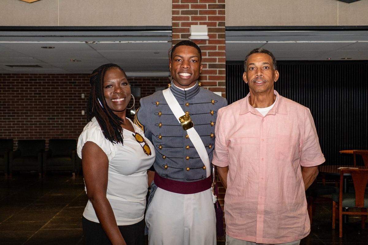 Robert Alston Jr. poses for a photo with his parents, Doreen and Robert Alston, Sr. of Sheldon, during his graduation from the United States Military Academy West Point.