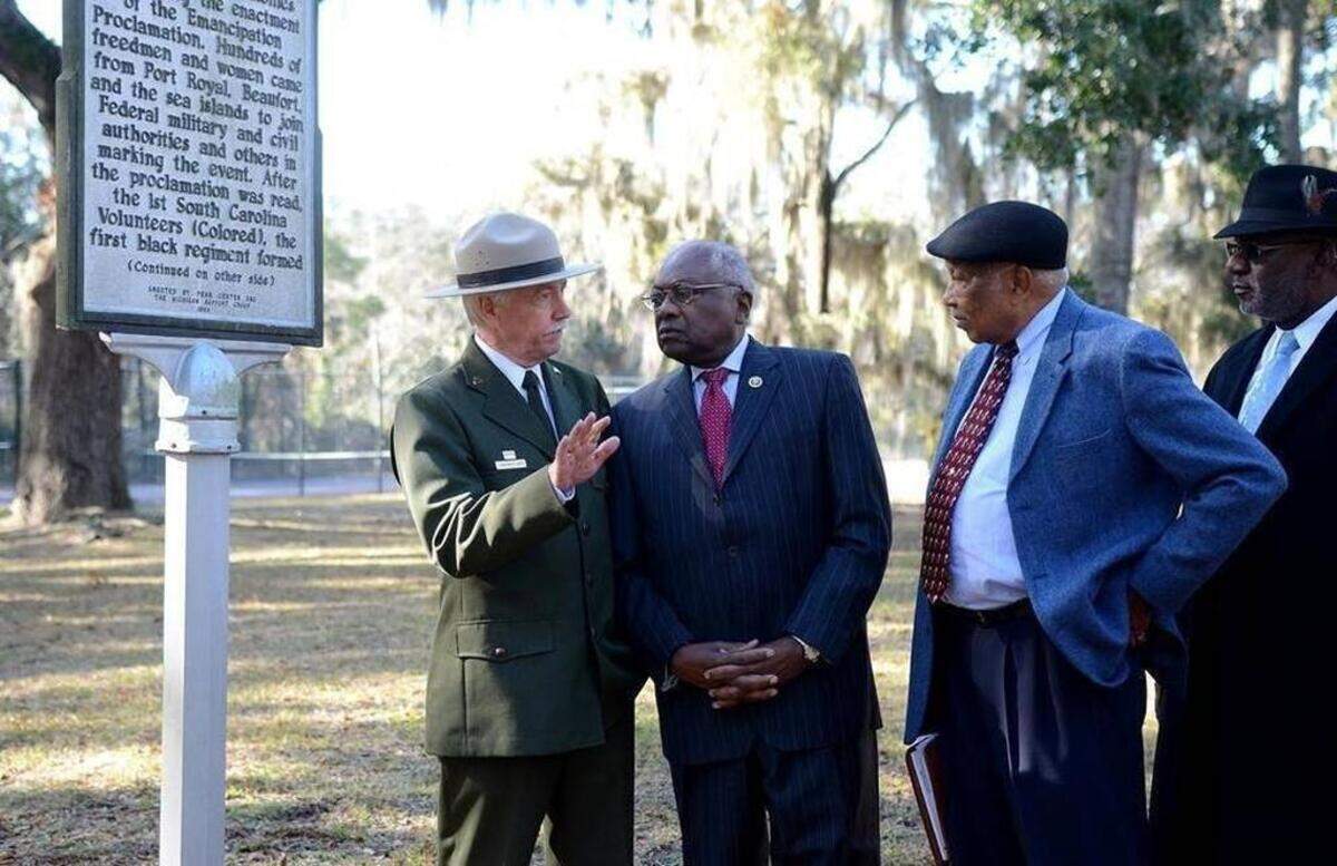 National Park Service director Jonathan Jarvis, from left, talks with Congressman Jim Clyburn and Port Royal Mayor Sam Murray on Dec. 15, 2016, on the Naval Hospital Beaufort campus in Port Royal. The Port Royal site is part of a national monument to the Reconstruction Era.