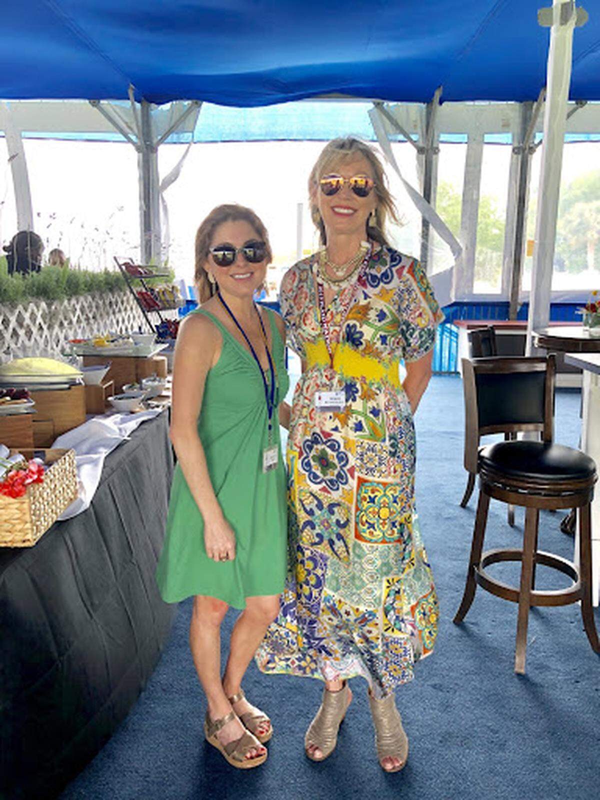 Terri Kennickell of Savannah has been attending Heritage for the last 4 years and today enjoyed the company of her daughter, Kacey Ray. Both wore the perfect spring-dresses, featuring bright colors. Terri’s gold and white statement pieces went perfectly with her beautiful flowy, yellow dress. PS: her shoes were the perfect pick for her outfit as well).