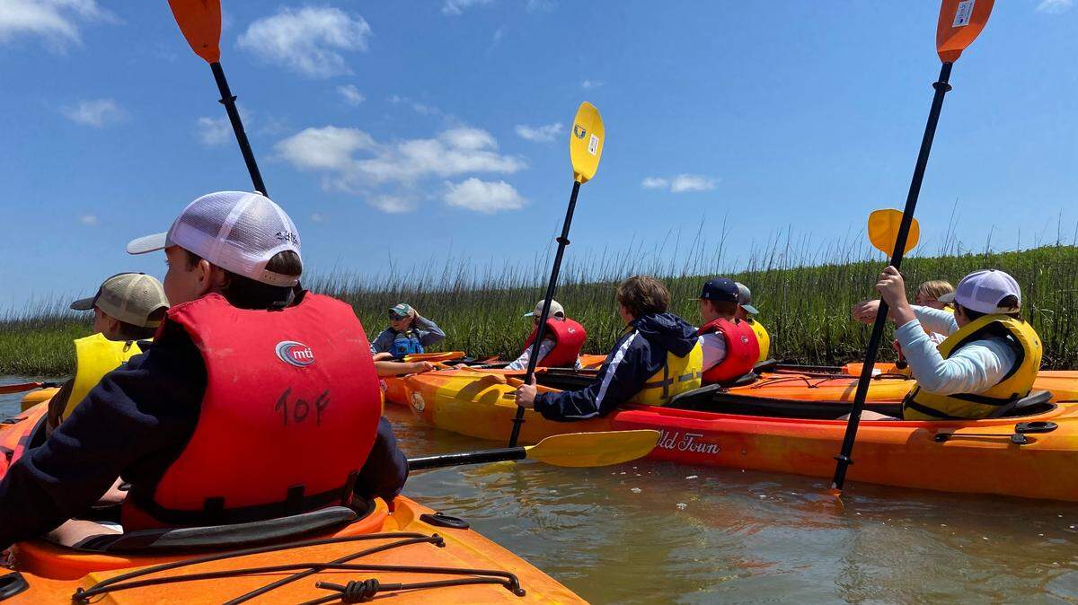 A group of Hilton Head Christian Academy seventh graders kayaking along the Broad Creek River to learn about the environment around them and how to protect it Monday, May 9, 2022 on Hilton Head Island.