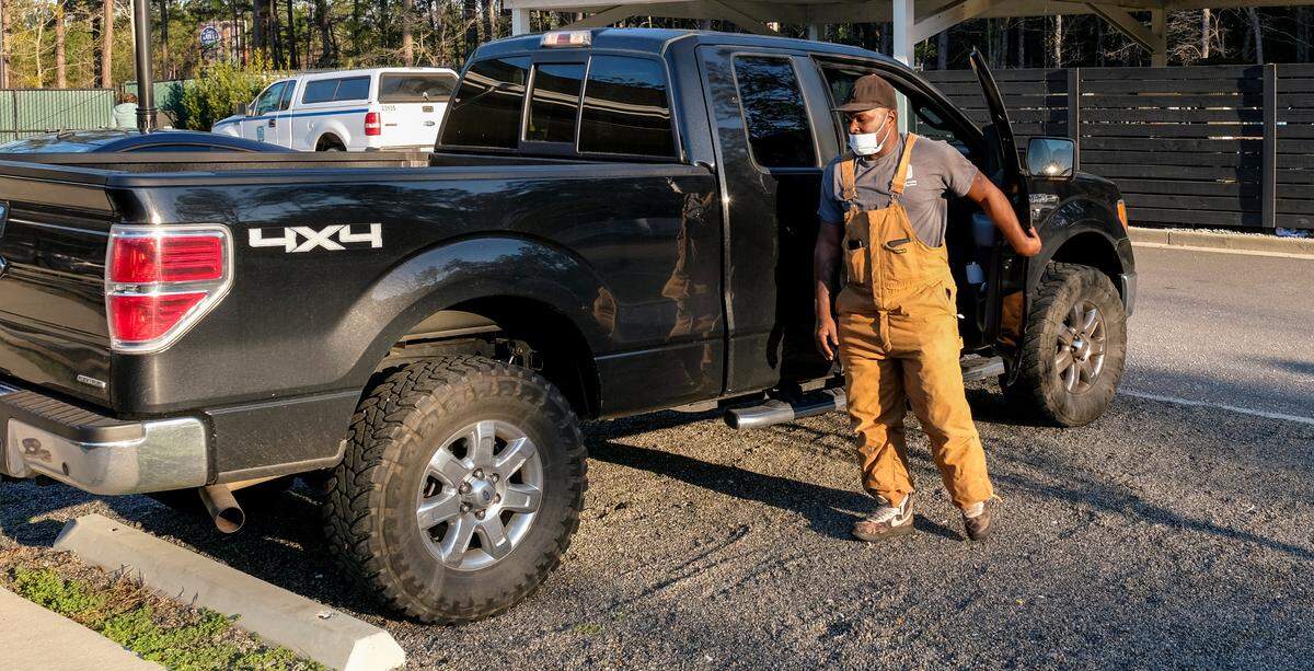 After getting off work at 12:40 a.m., as a shift manager at Wendy’s restaurant in Beaufort, Lady’s Island resident Trevor Heyward arrives at 8 a.m. on Thursday, Feb. 25, 2021 at Beaufort County Animal Services in Okatie. Heyward, who has a suspended drivers license, meets a fellow-co-worker at a set location to carpool to work together.