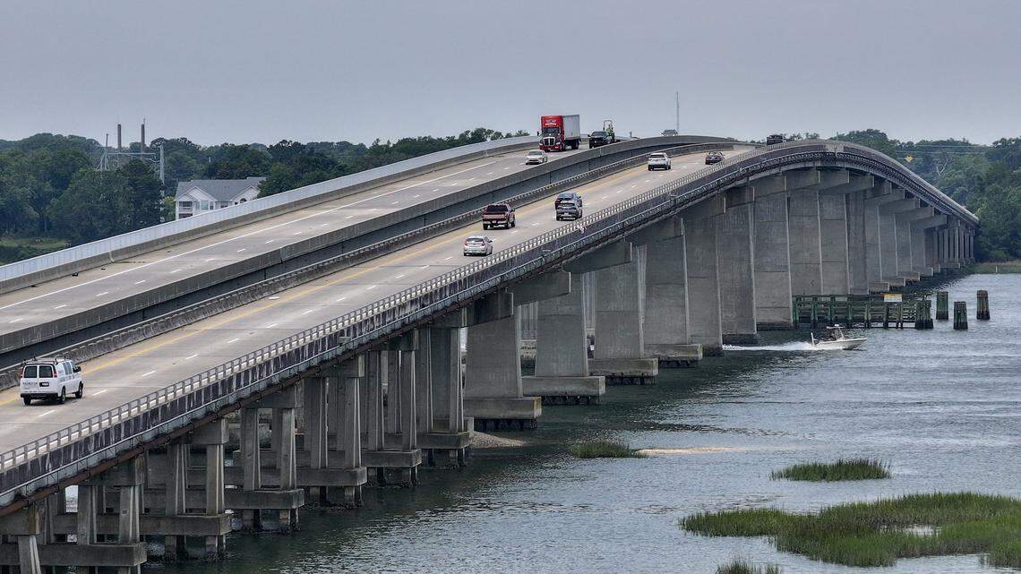 A boat cruises along the Beaufort River underneath the J.E. McTeer Bridge on June 3, 2025, that connects Port Royal to Lady’s Island.