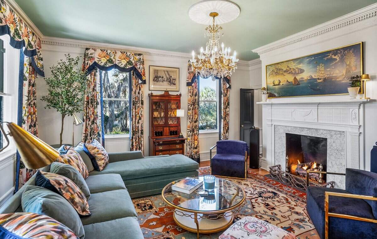 The living room directly to the left of the home’s entrance.