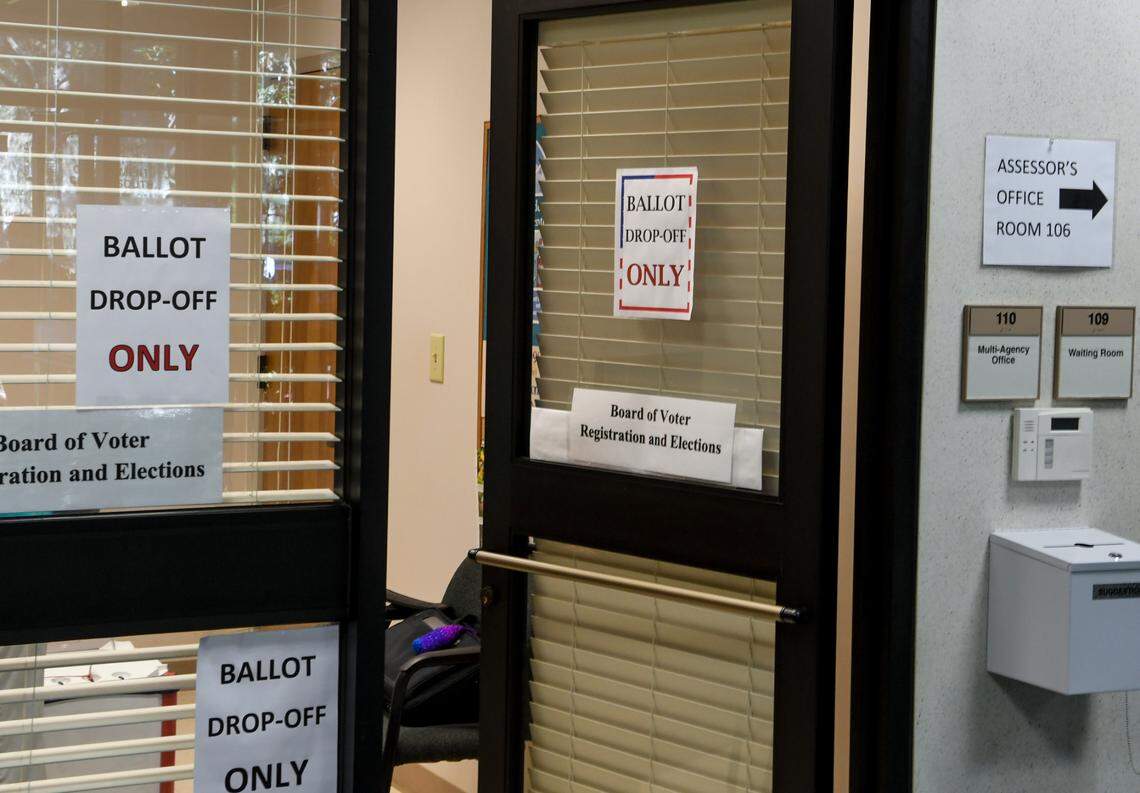 An office located in the Beaufort County government building on Hilton Head Island was staffed with a poll worker on Tuesday, Oct. 13, 2020 to accept absentee ballots. Before voters could drop their ballot into the box, a poll worker checked the voters identification and signatures and then time stamped the envelope. Many were upset there was no drop box and had to wait in line to have their identification checked before being able to submit their absentee ballot.