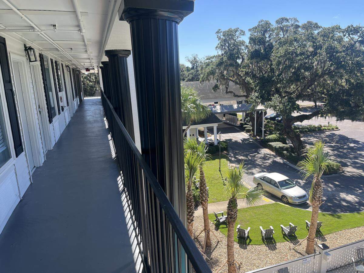 The Pearl Studio Apartment Community has four stories and 150 rooms.