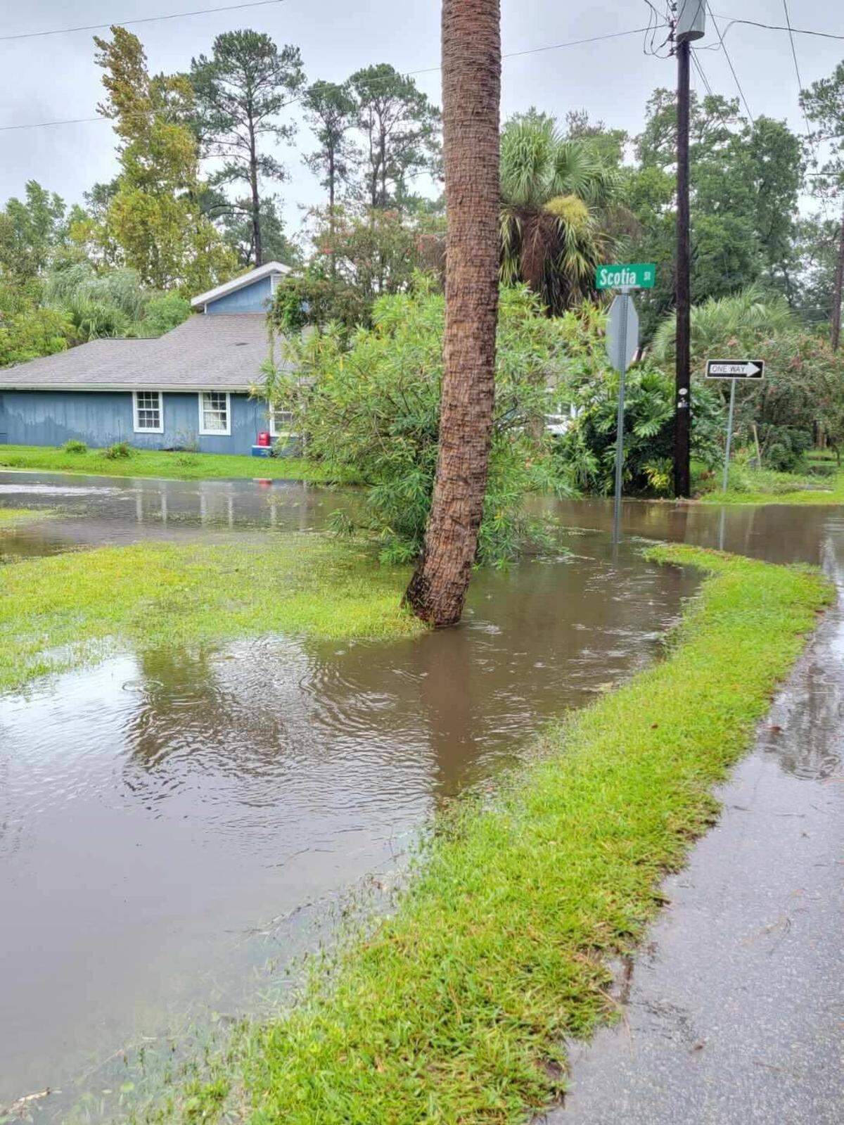 Water quickly flooded streets and residents’ yards in the Alljoy neighborhood in Bluffton, South Carolina, on Monday, Aug. 5, 2024.