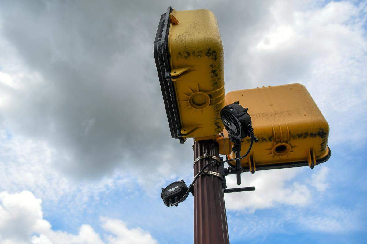 The small black boxes under the pedestrian signals at Mathews Drive and William Hilton Parkway have thermal imaging cameras that sense when pedestrians are waiting to cross that are coupled with Hilton Head Island’s new adaptive signal system. If pedestrians leave the zone the system goes back to managing traffic.