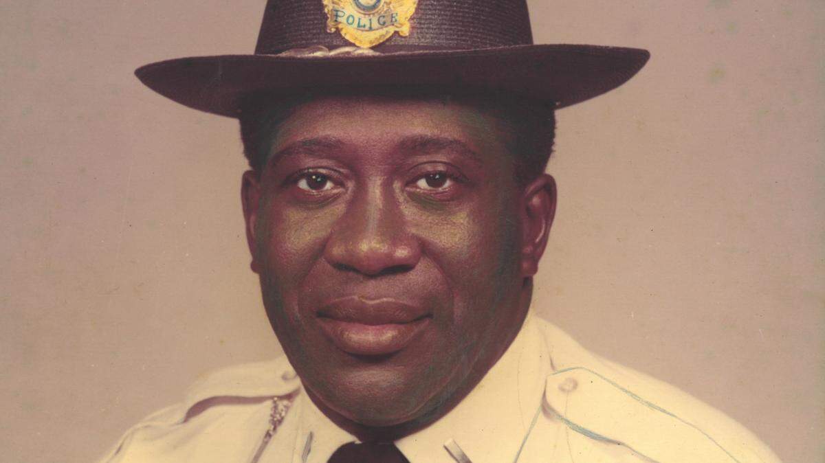 Joseph Linnen in Beaufort Police Department uniform and assistant chief badge.