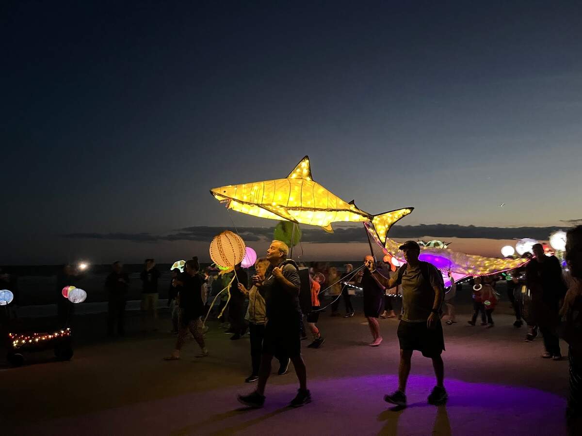 A shark lantern was held up high Saturday on Hilton Head for the 2022 lantern parade.