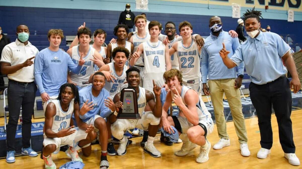 The Hilton Head Island boys basketball poses for a photo after winning the Region 7-4A championship last month. The Seahawks will play South Pointe for the Class 4A championship on Saturday in Aiken.