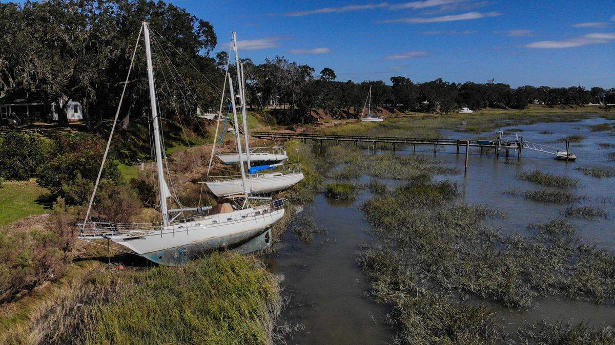 Several boats – likely from the Beaufort Marina – are currently stuck on the Beaufort River’s bank after Tropical Storm Helene moved through the area on Sept. 27 and less than two weeks later, Hurricane Milton.