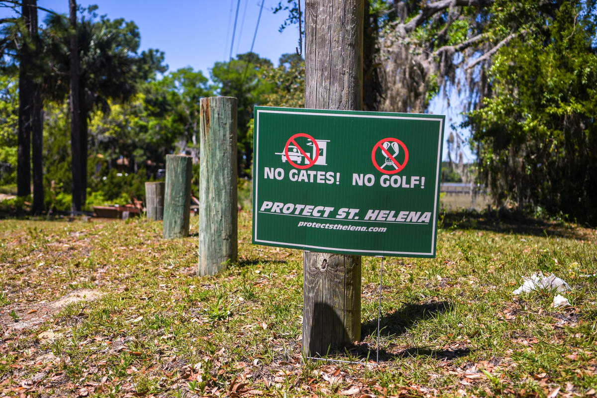 Yard signs denouncing the proposed development of Pine Island into a gated, golf course community are prevalent on St. Helena Island. This photo was taken on April 12, 2023.