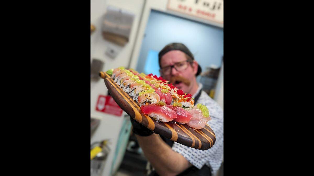Sushi chef Justin Patton compares eating at Locals Raw Bar on Lady’s Island to “dinner and a show.” “It’s buzzin’,” he says.