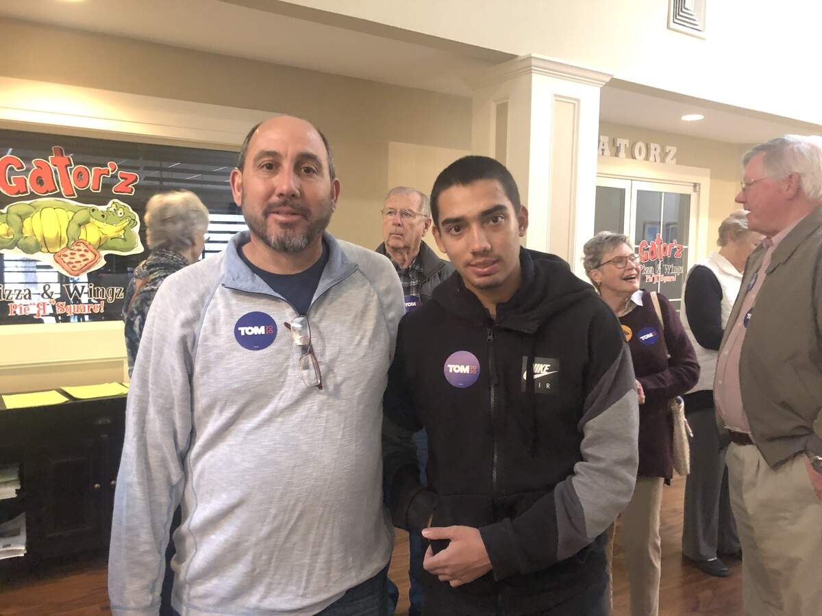 Tommy (left) and Michael Battista, of Bluffton, stand in line to see Tom Steyer at his visit to Hilton Head Monday morning. The father/son pair has seen a handful of Democratic candidates and are undecided on who they’ll vote for.