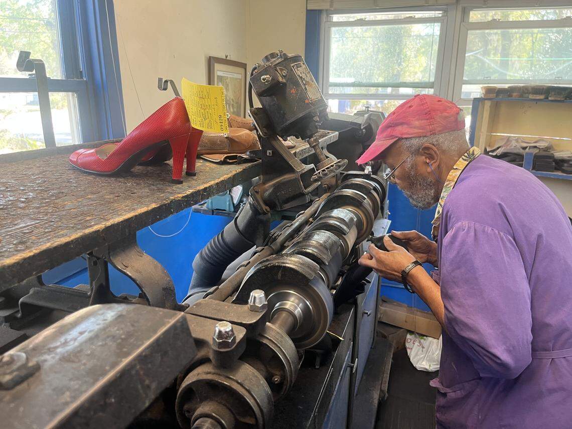 Stephen Moley works on repairing a shoe at Mobley’s Shoe Repair, the only shoe repair shop in Beaufort.