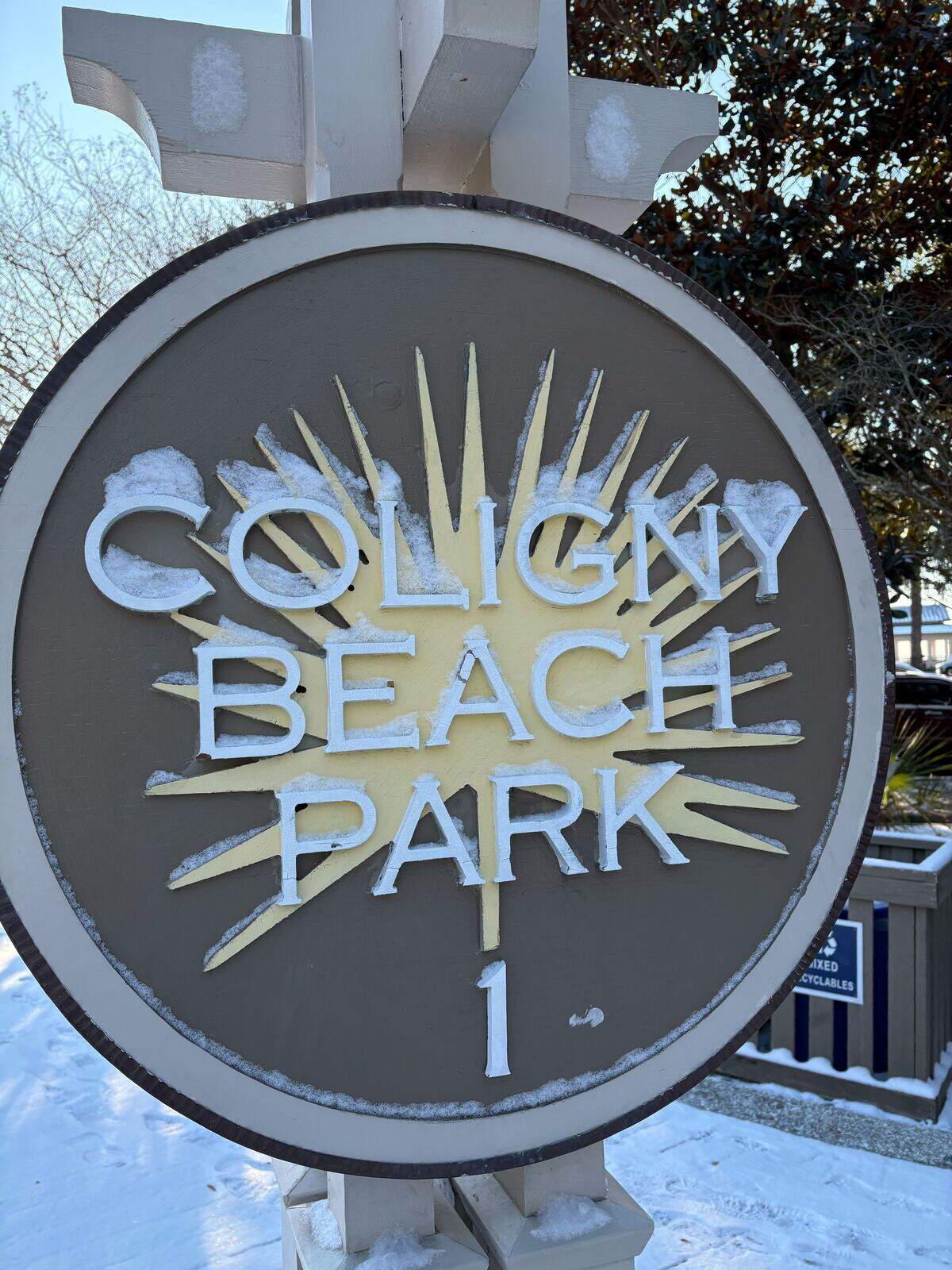 The sign for Coligny Beach Park was sprinkled with snow Sunday, Feb. 1, 2026 on Hilton Head Island.