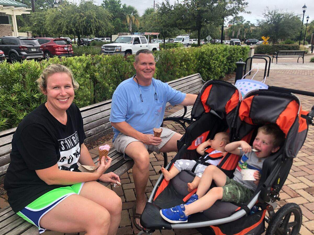 Three-year-old Powell Sailor, his sibling JJ and his parents Richard and Paige Sailor enjoy ice cream outside of Kilwins ice cream shop on Hilton Head Island’s Shelter Cove Towne Centre on Monday, August 3, 2020. Tropical Storm Isaias didn’t deter the family, visiting from near Athens, Georgia, from going out to lunch and shopping on the island.