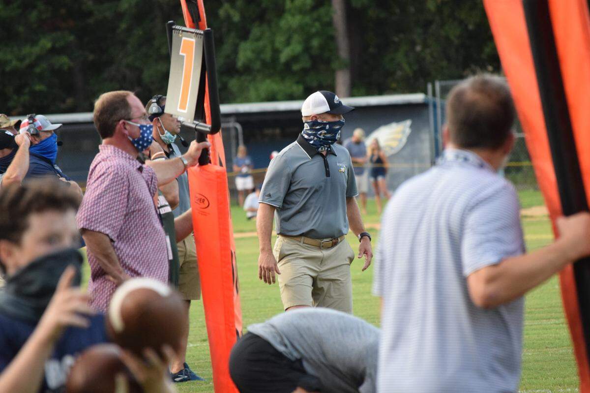 Football coaches for Hilton Head Christian Academy wore face coverings during the team’s first home game of the season Friday, Aug. 28, 2020 on Hilton Head Island.