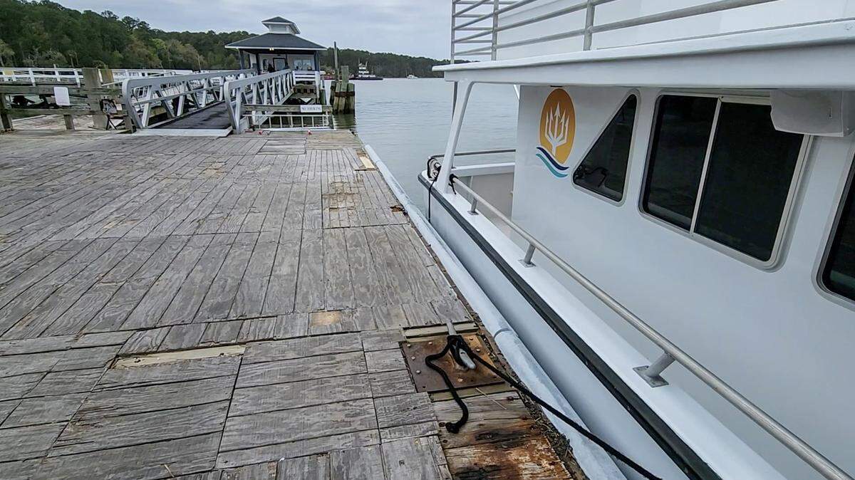 The Manatee II, the public ferry boat that travels from Pinckney Island to Daufuskie Island, tied up at the Melrose Boat Landing on March 26, 2024 on Daufuskie Island. The privately-owned dock has issues with its decking and missing or broken cleats.