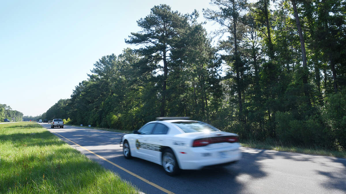 Traffic rolls toward Beaufort on SC 170 in between Cherry Point Road and Pritcher Point Road in Okatie on Friday. The owners of the Beaufort County land along the right side of the highway between Cherry Point Road and Pritcher Point Road recently proposed that their property be annexed into Hardeeville in Jasper County, but a Beaufort County judge has issued a temporary restraining order against the landowners to halt the annexation attempt.