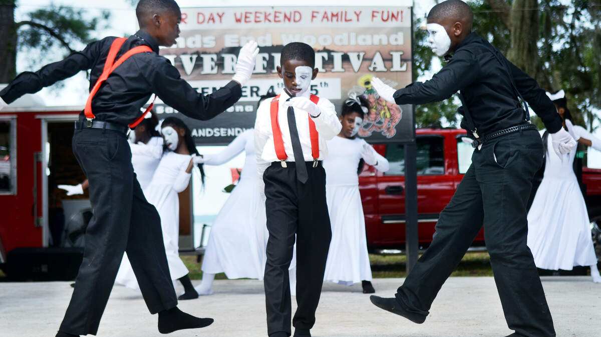 Members of Courtney's Praise Dancers from Laurel Bay perform during the Lands End Woodland River Festival on Saturday on St. Helena Island. The 11th annual Labor Day weekend event is a multicultural community celebration of the Gullah ancestry and history of the people of the island. Saturday was the second day of the two-day festival and featured Gullah culture, storytelling, singing and dancing as well as arts and food vendors.