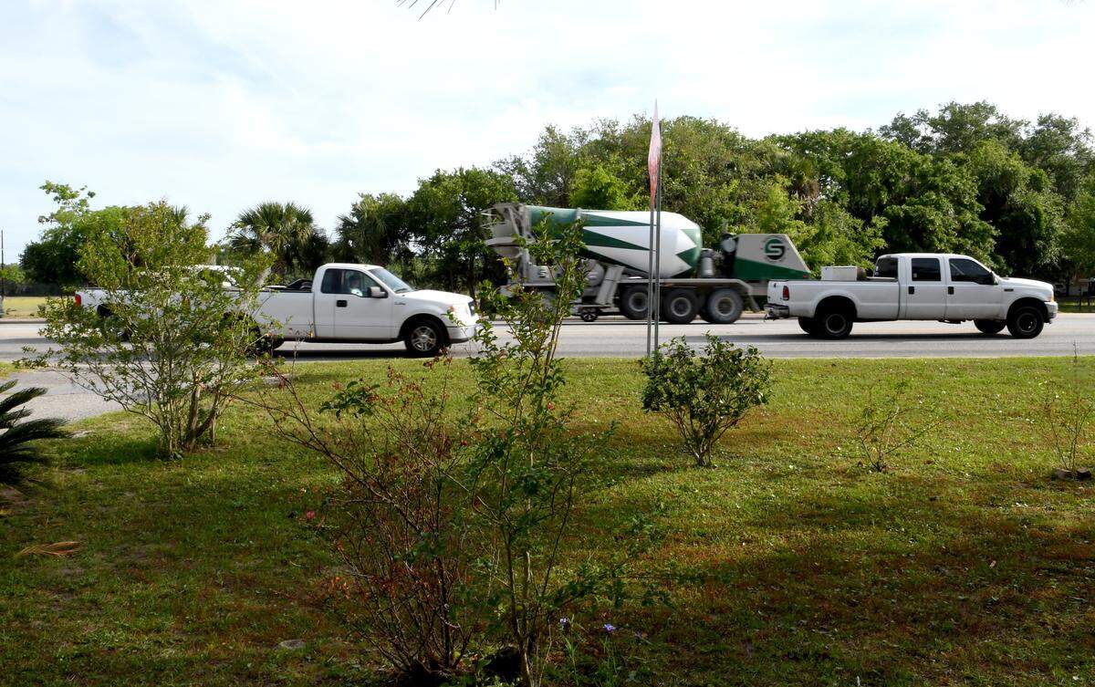 Traffic barrels past the front yard of Isabelle Stewart’s home in the Stoney neighborhood of Hilton Head Island on Thursday morning,  which sits about 50 feet from the shoulder of U.S. 278. The one percent transportation tax&nbsp;that started on Wednesday, May 1 will be used to alleviate congestion and build more sidewalks and pathways in the county. Some of that money will be used to replace at least one span of the Hilton Head bridge and holds the possibility of adding lanes if the S.C. Department of Transportation suggests that would help alleviate congestion. Stewart’s home would be dangerously close if the highway is expanded from two to three lanes in each direction. 