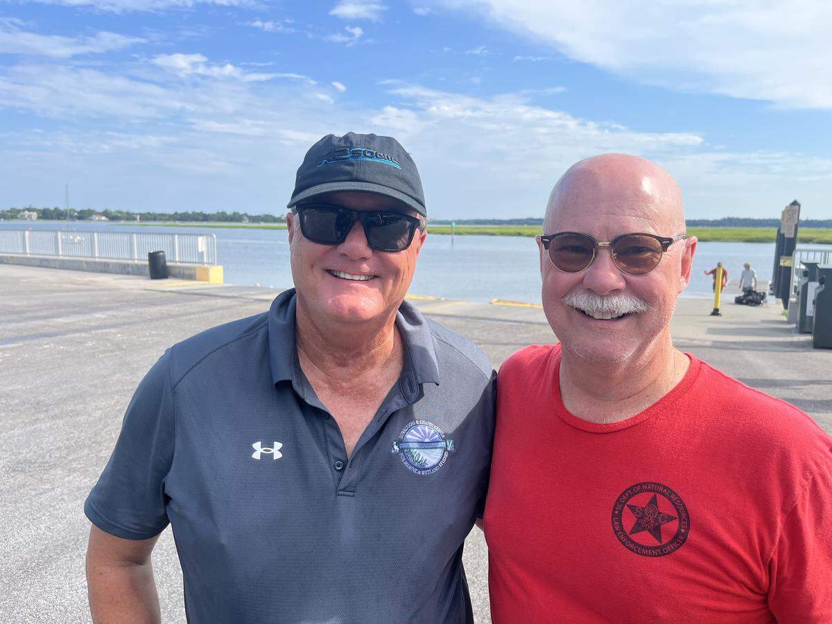 Paul Gayes of Coastal Carolina University and Tom Mullikin, director of the South Carolina Department of Natural Resources, prior to launching at the White Hall Boat Landing on Lady’s Island to work on an experimental project to protect the shoreline of Parris Island from erosion.