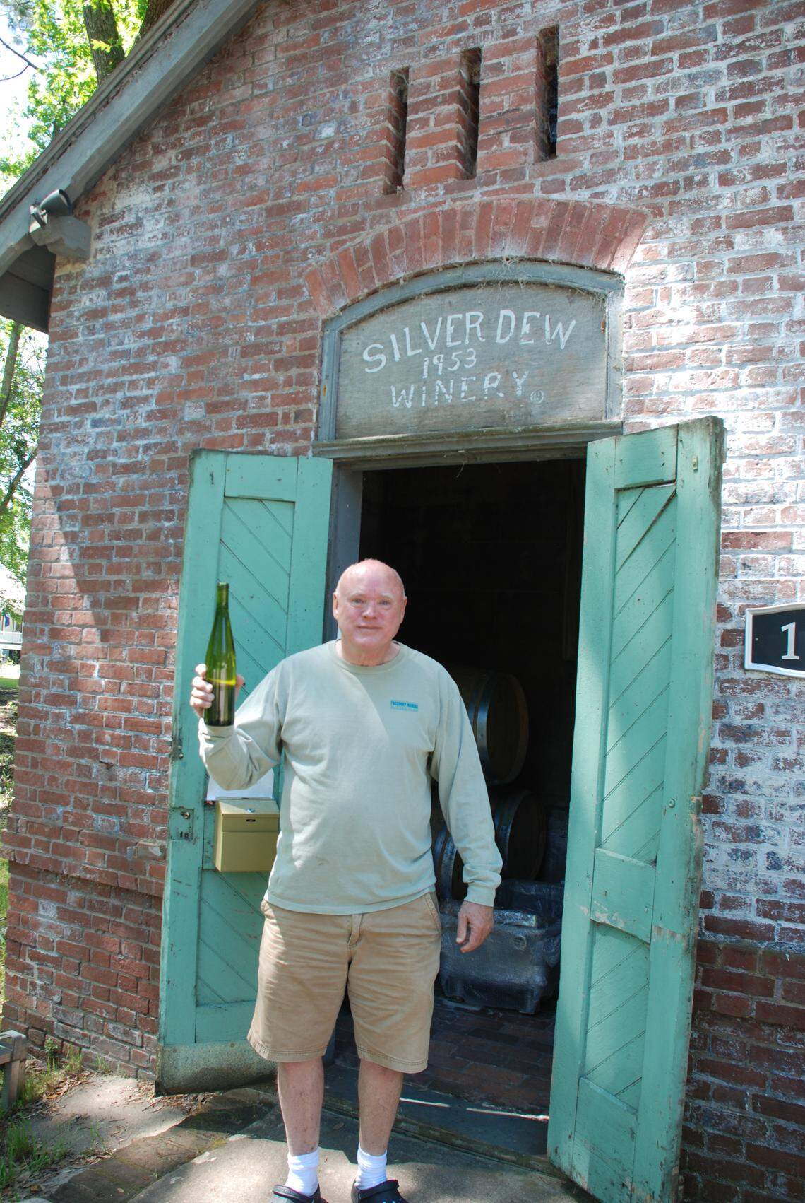 Wick Scurry, owner of Silver Dew Winery, hand bottled the first bottle of wine to come out of Silver Dew Winery in more than 60 years on April 25, 2018.