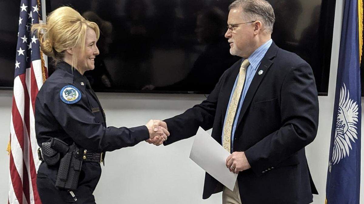 City manager Scott Marshall swore in Stephenie Price as interim chief of the Beaufort Police Department on Monday morning.
