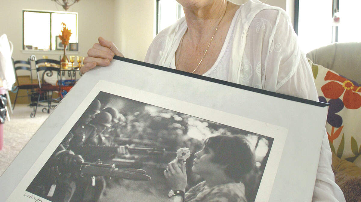 Jan Kasmir of Hilton Head Island holds the iconic photo of herself taken in 1967.
