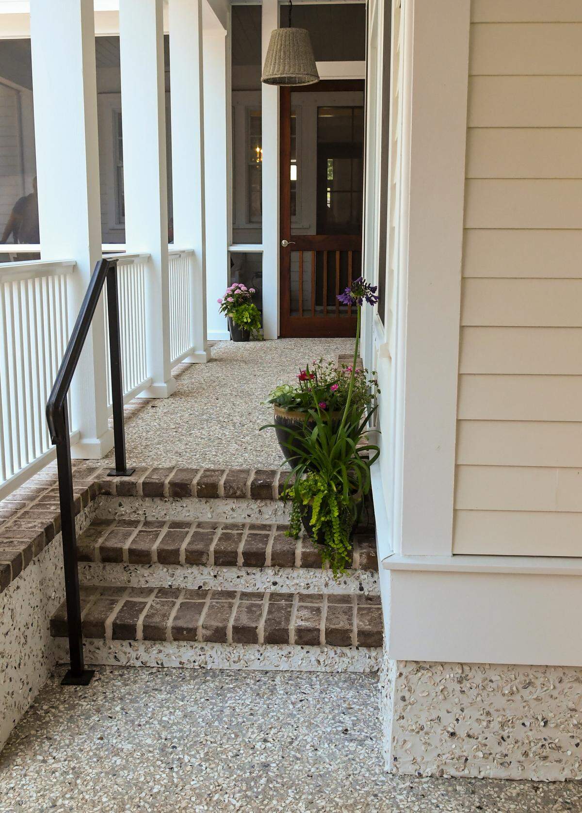 This back entrance to the home could be built with a ramp or later retrofitted to accommodate a ramp for those needing easier access or if mobility issues arise.
