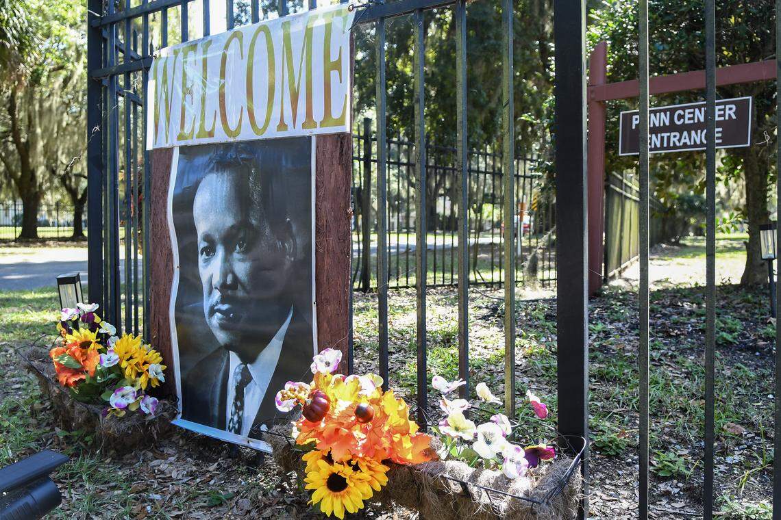 A poster of Martin Luther King Jr. welcomes visitors to the Penn Center on Oct. 14, 2025, on St. Helena Island, its entrance just over half a mile from where a mass shooting took place outside of Willie’s Bar and Grill.