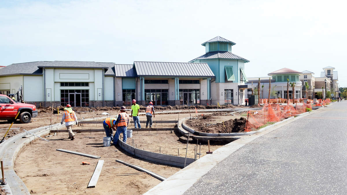 Construction continues Wednesday at Shelter Cove Towne Centre, which has recently added some tenants. Final plans were recently approved for a waterfront park behind the shopping center, and the Town of Hilton Head Island is considering plans for apartments nearby.
