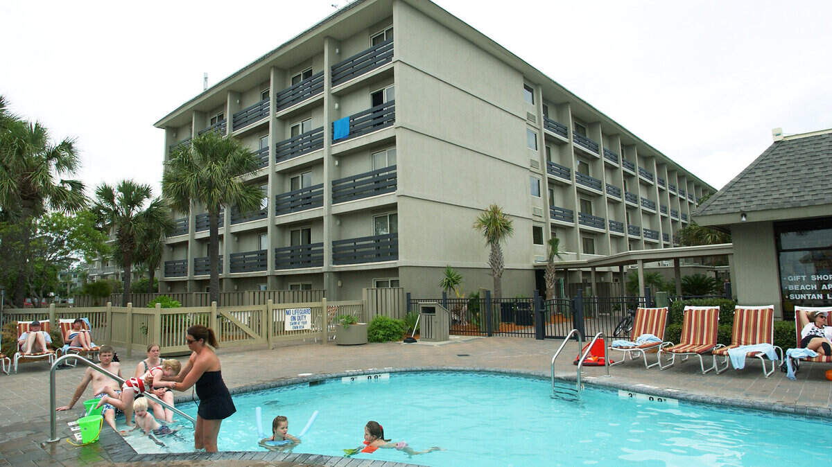 Guests enjoy themselves at the pool of the Holiday Inn 
