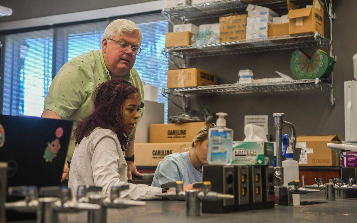 Hannah Pratt, left, a senior at the University of South Carolina Beaufort asks Joe Staton, professor of biology and marine science, a question during their hands on lab work using clay to build models showing the transformation of an embryo on Tuesday, Jan. 17, 2023 at the Science and Technology building at the Bluffton campus. Staton would be one of the professors to lead students to research on Pritchards Island if the $1.25 million funding is approved by the S.C. state legislature.